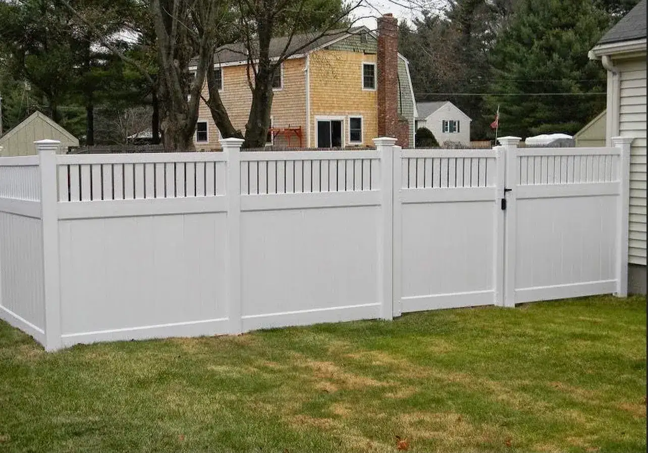 White vinyl privacy fence with a lattice top